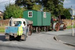GB The steam roller was hauling a living van, water bowser and a Land Rover