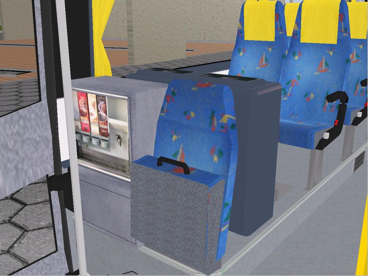 Autobus je vybaven tak sedadlem pro prvodce, kvovarem a lednic